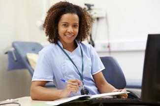 Nurse sitting at desk