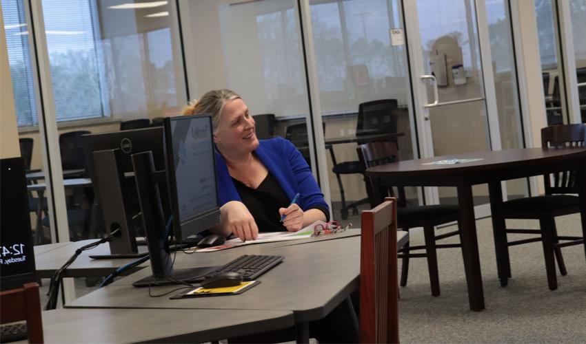 Natalie Freese, Director of Learning Commons enjoying Liz Sitta's speech.