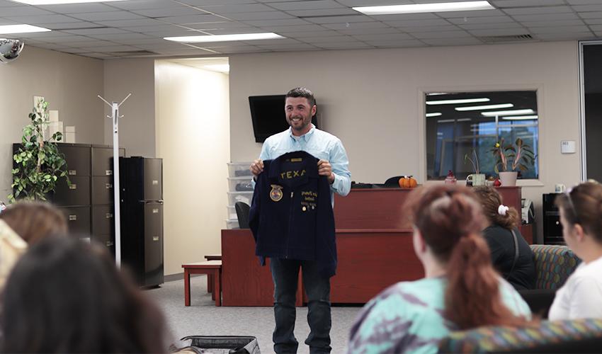 Tyler Froberg showing off a jacket.