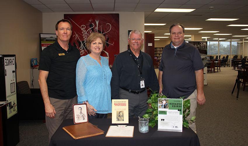 Picture of Don Jefferies with the Library staff.